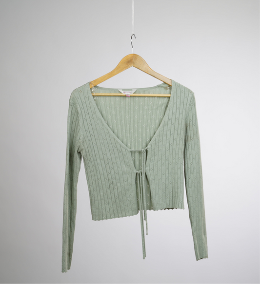 Green knitted cardigan